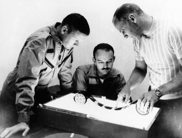 Apollo 11 astronauts Neil Armstrong, Michael Collins and Buzz Aldrin examine film taken of their mission. Credit: NASA