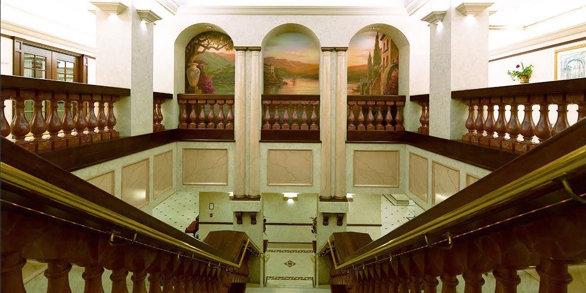 Here's The Towers' grand staircase, which echoes the grandeur of its early days as a hotel. 