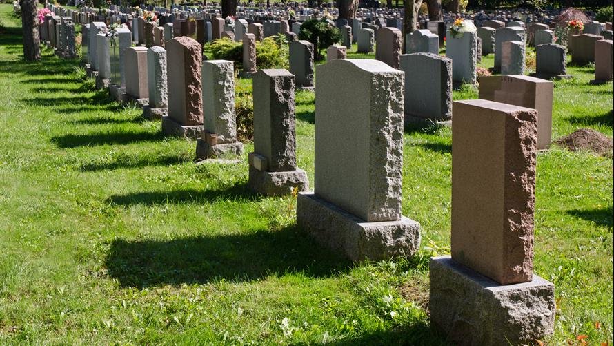 This creepy 3200 digital tombstone has a 48inch screen to ...