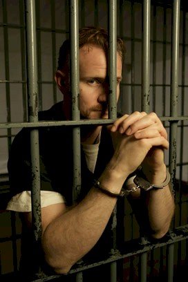 http://www.toomanymornings.com/wp-content/uploads/2009/09/man-in-jail.jpg