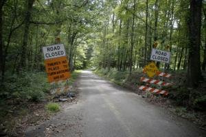 Road signs are placed on the edge of the road leading&nbsp;&hellip;