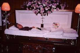Image result for corpse in casket
