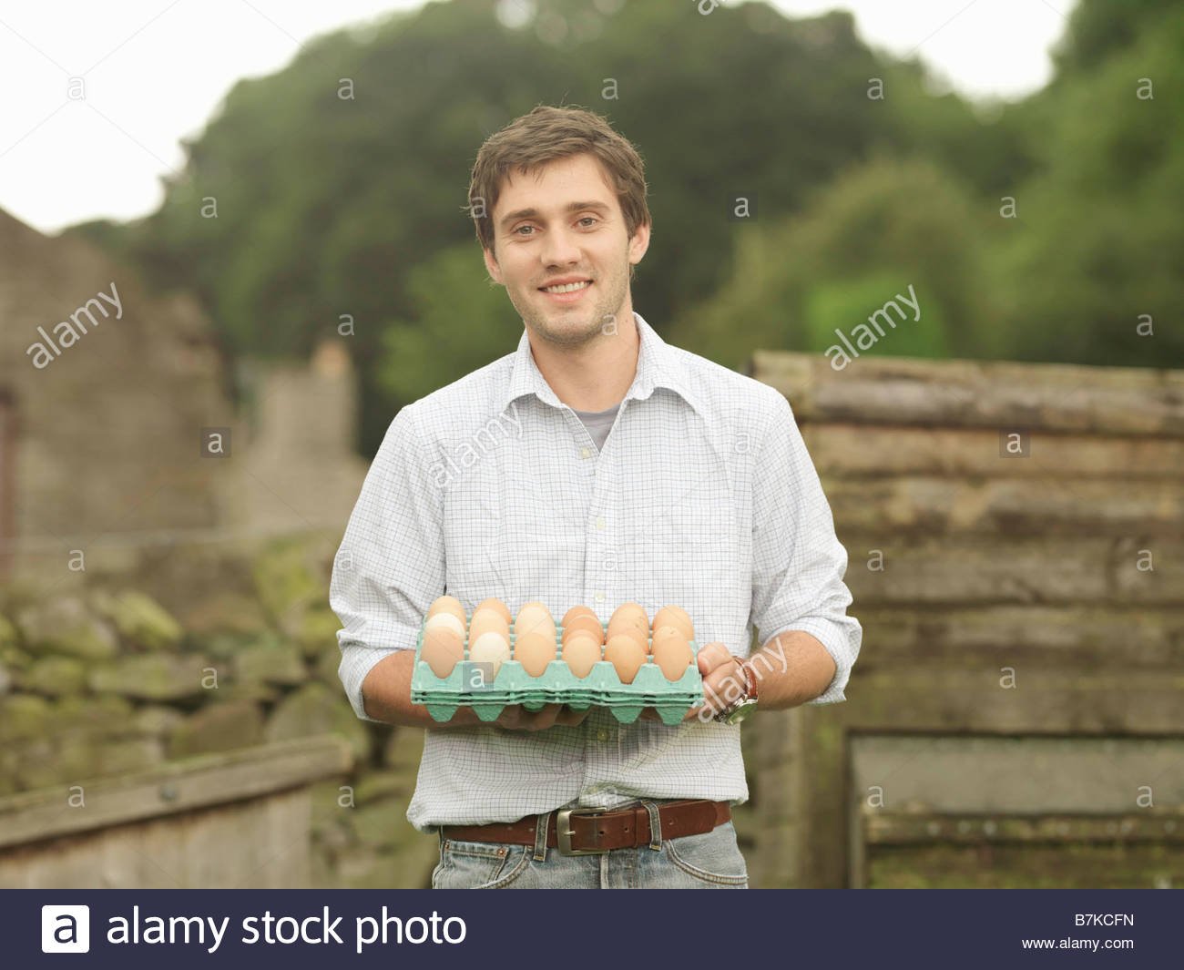 Portrait Young Man Holding Eggs High Resolution Stock Photography and  Images - Alamy