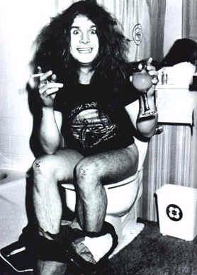 http://blackliberal.files.wordpress.com/2008/03/sitting-on-toilet.jpg