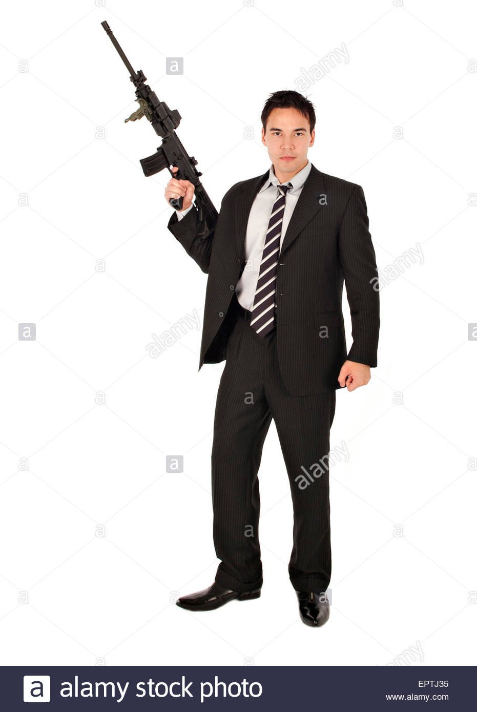 White man standing with an AR-15 Semi automatic gun Stock Photo ...