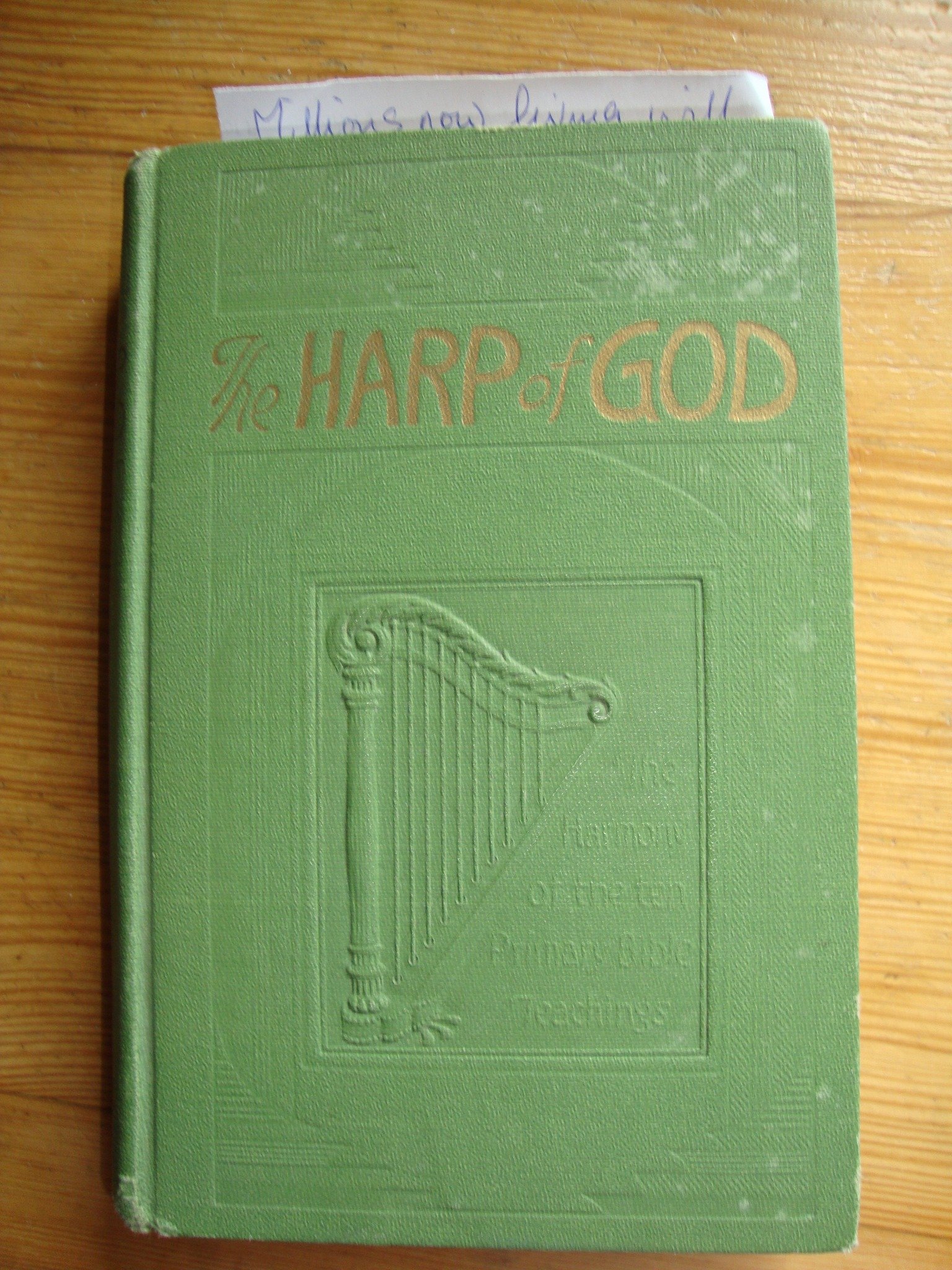 May be an image of diary, harp, book and text
