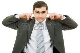 Image result for businessman with fingers in ears