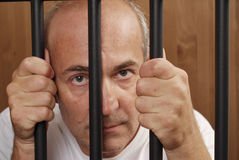 Man Behind Bars Royalty Free Stock Photography