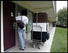 Stella Oselem, 78, arrives at her new hotel room in Rockville, emergency housing made possible by the American Red Cross.