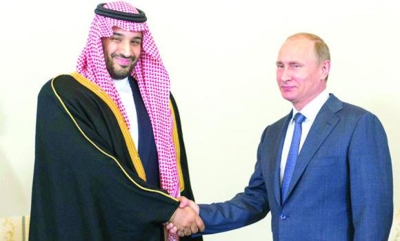Deputy Crown Prince Mohammed bin Salman with Russian President Vladimir Putin at the Konstantin Palace outside St. Petersburg, Russia, in June