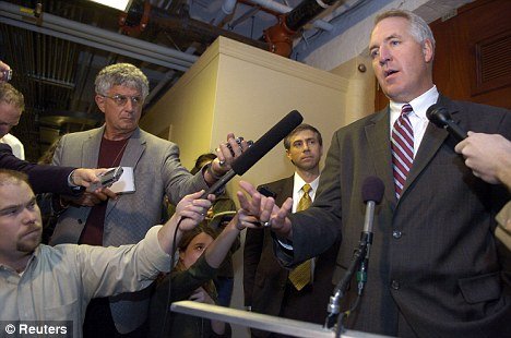 Quizzed: Illinois Republican Representative John Shimkus answers questions for reporters after appearing before the House ethics committee