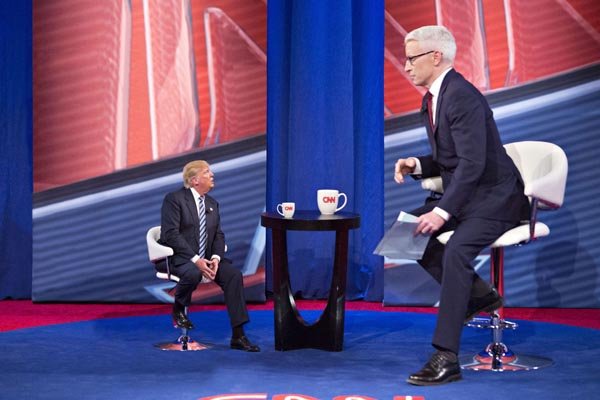 http://cdn.smosh.com/sites/default/files/2017/02/tiny-trump-meme-anderson-cooper.jpg