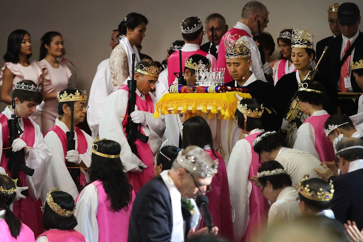 World Peace And Unification Sanctuary Religious Group Holds Blessing Ceremony For Couples And Their AR-15 Rifles